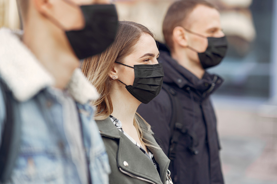 people masks stands street